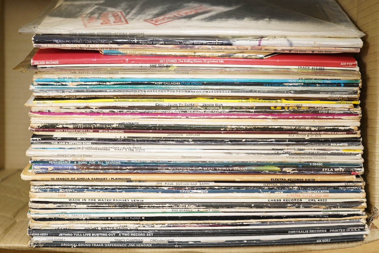 Fifty-four 1970s LP record albums, artists include; The Rolling Stones, the Butterfield blues band, The Who, the Jam, Alan Price, The Velvet Underground, Thin Lizzy, Creedence Clearwater Revival, Jethro Tull, Tracy Chapm